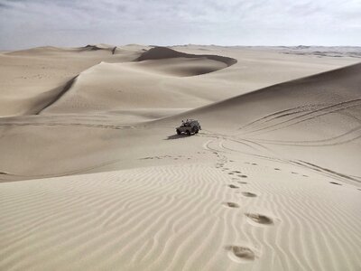 Jeep tracks sand photo