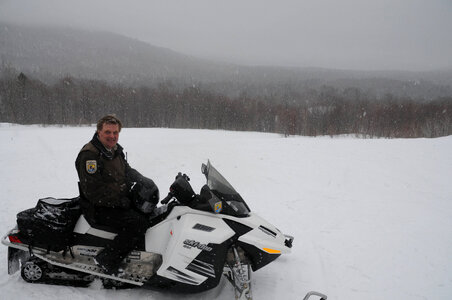 Service law enforcement by snowmobile-1 photo