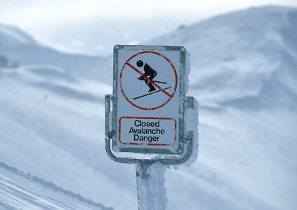 Avalanche sign on ski station photo