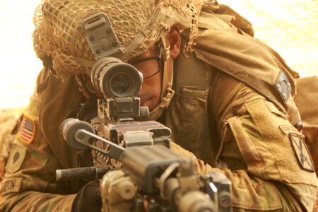 Army soldier with rifle. photo