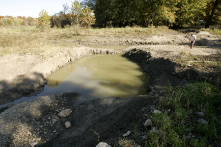 Service employee surveys flood damage-3