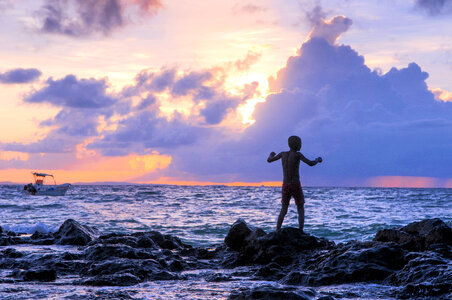 Child on the seashore in Madagascar photo