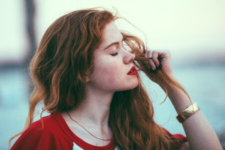 Side Portrait of Red Haired Woman photo