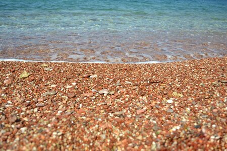 Pebbles blue sand