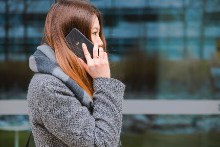 Young woman talking on mobile phone photo