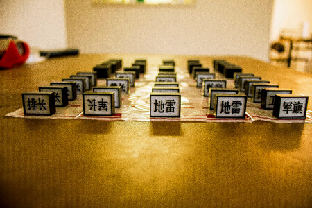 Chinese Army Chess setup on a table photo