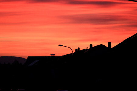 Red-orange sundown in the village