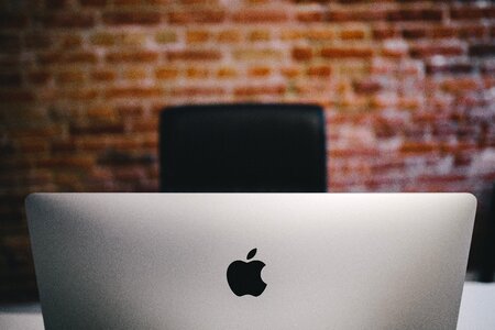 MacBook Brick Wall Desk photo