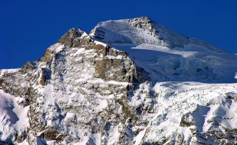 Cimon della Pala mt on a path in the snow photo