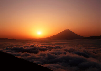 Silhouette of Mount Fuji from the clouds photo