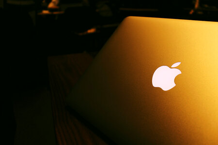 Macbook Pro at night with apple logo