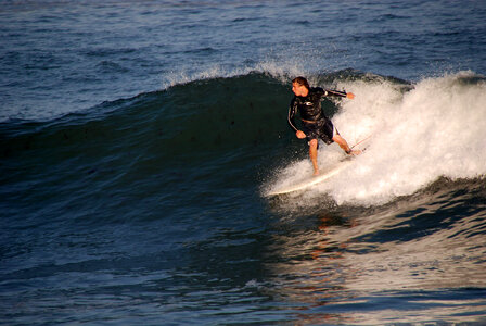 Surfer on a big wave in Rhode Island photo