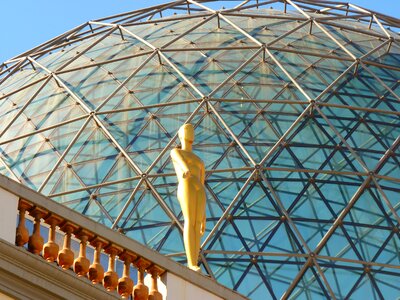 Glass dome figure golden