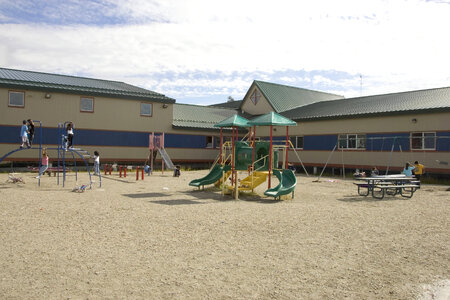 Children playing outside their school