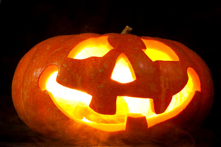 Scary Halloween Pumpkin on Black photo