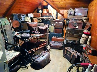 Vintage suitcases stacked for loading photo