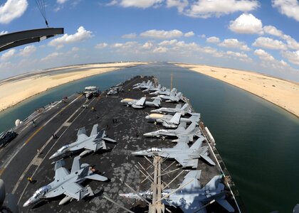 Aircraft carrier ship jet fighters photo