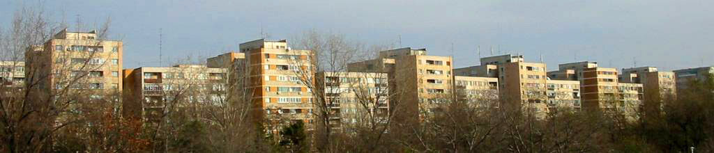 Skyline of apartment blocks in Bucharest, Romania photo