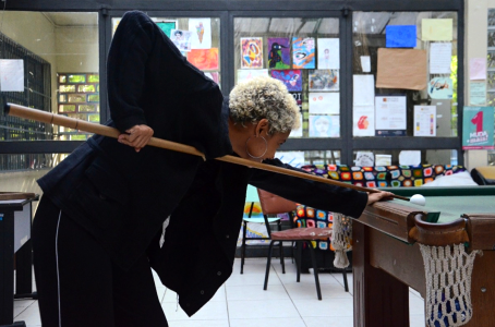 Woman playing pool photo