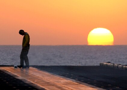 Silhouette sailor deck photo