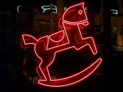 Neon light neon red rocking horse