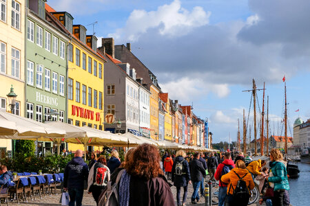 Tourists Admiring Colorful Buildings in Copenhagen photo