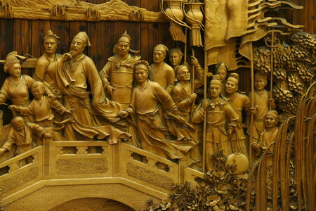 Wood carving panel depicting the feats of Su Shi photo