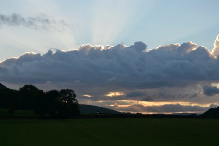 Cloudy rays evening photo