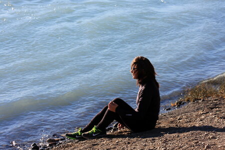 young woman in relax resting on the sea on the beach photo