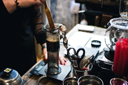 Brewing coffee in Aeropress filter photo