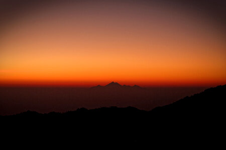 Sunset and Dawn and a far peak and landscape photo