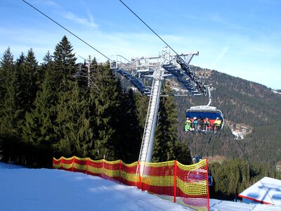 Lift skiers skiing photo