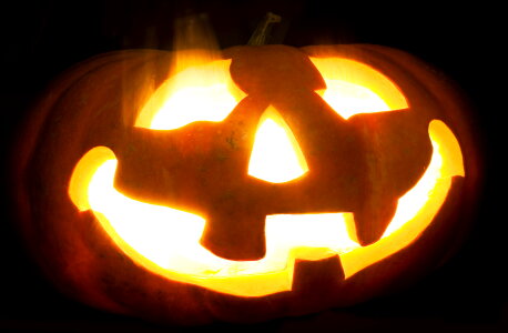 Halloween pumpkin on black photo