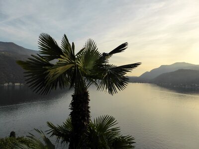 Evening sky mountains lake photo