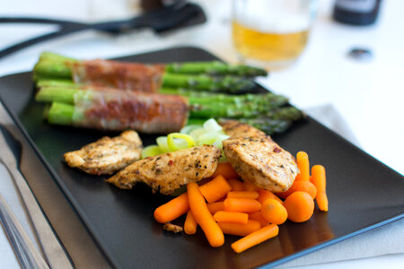 Chicken steak with vegetables and beer photo