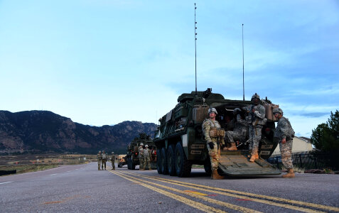 Soldiers and Stryker vehicles photo