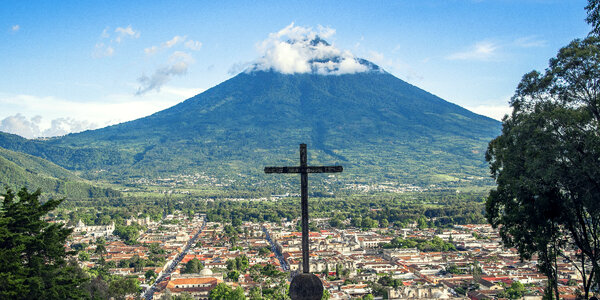 Aerial View of a city with Mountain in the background photo