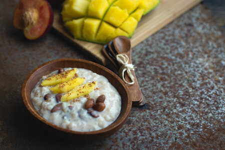 Exotic coconut rice and beans dessert with mango photo