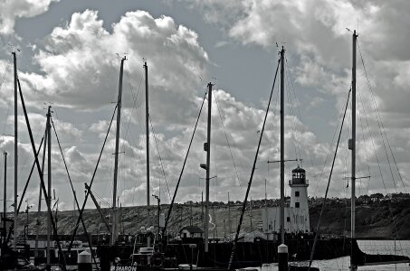 Lighthouse boats sea photo