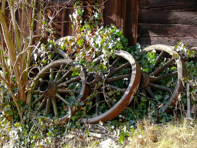 Still life old wheels farmhouse photo