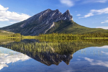 Sukakpak Mountain and reflective Lake in Alaska photo