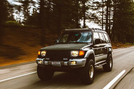 Motion Blur Shot of SUV on the Road photo