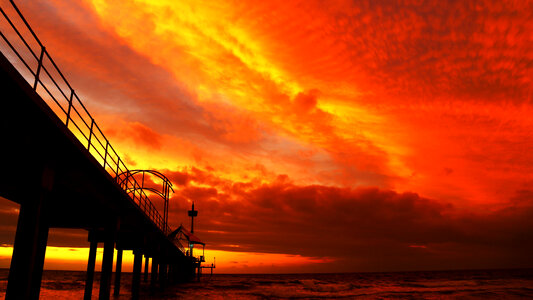 Red Skies over the sea and bridge