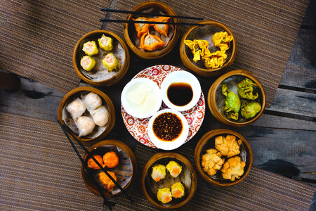 Vibrant shot of feasting on chinese steamed and fried dim sum photo