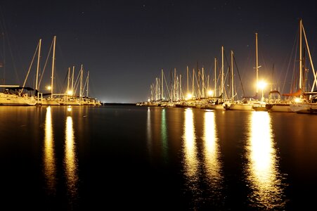 Sailing boats night lights photo