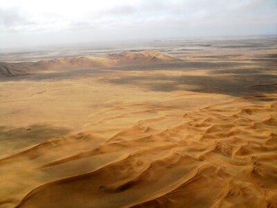 Rippled sand dunes aerial shot photo