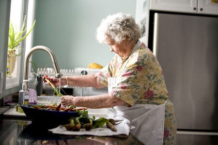 Cleaning cooking elderly photo