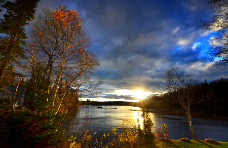 Late Afternoon Lights with clouds and landscape in Quebec, Canada photo