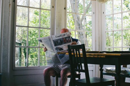 Old Man Reading Newspaper Morning photo