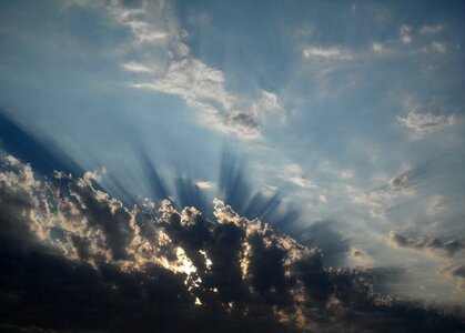 Blue sky light rays dark rays photo